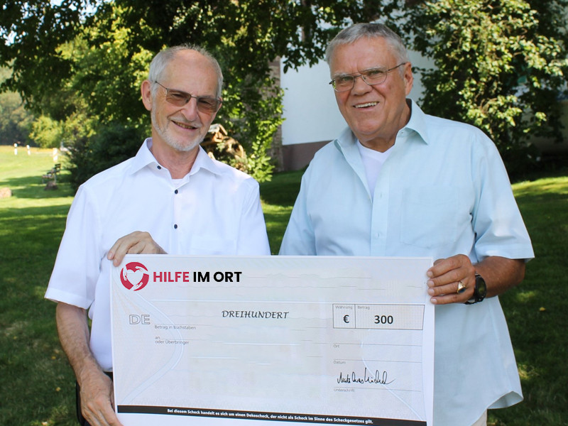 Scheckübergabe an Herrn Berger durch unseren Bürgermeister